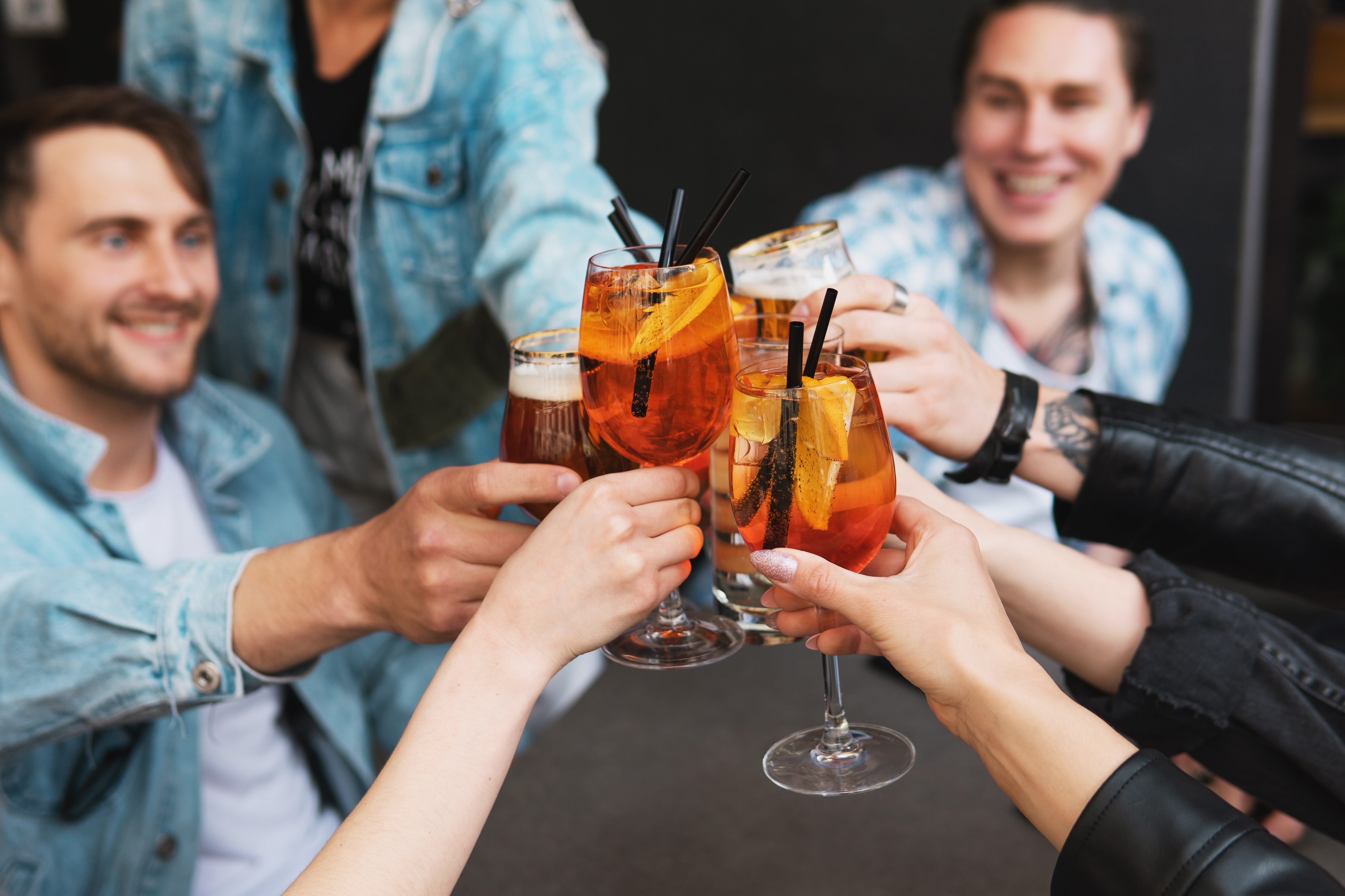 friends-celebrating-and-holding-glasses-with-diffe-2026-01-05-05-53-18-utc